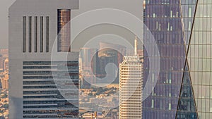 Dubai World Trade Centre on the Sheikh Zayed Road behind office towers in financial district aerial timelapse from above