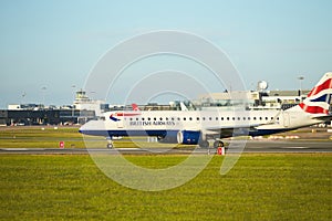 Dubli, Ireland - 10.11.2021: British Airways airplane on the Dublin airport. Commercial airplane jetliner landing in beautiful sun