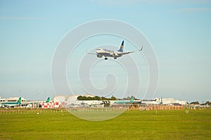 Dubli, Ireland - 10.11.2021: Ryanair airplane on the Dublin airport. Commercial airplane jetliner landing in beautiful sunset ligh