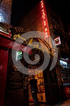 DUBLIN, IRELAND, DECEMBER 24, 2018: Temple Bar historic district, known as cultural quarter with lively nightlife. Nightscene of