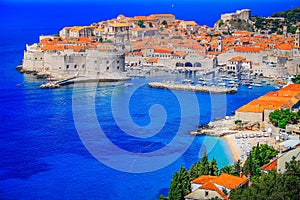 Dubrobvik old town, turquoise adriatic beach in Dalmatia, Croatia