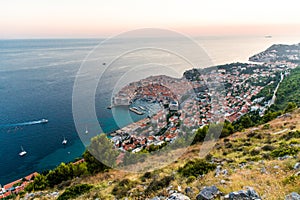 Dubrovnik, Croatia - July, 2019: View from the top of the mountain of Srdj to the old part of the city in the fortress in