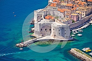 Dubrovnik harbor entrance strong defense walls aerial view, saint Ivan fortress