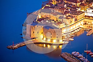 Dubrovnik harbor and strong defense walls aerial view