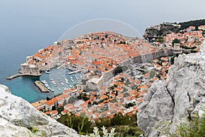 Dubrovnik seen between the rocks on Srd hill