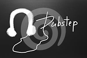 Dubstep text and Drawn earphones on blackboard