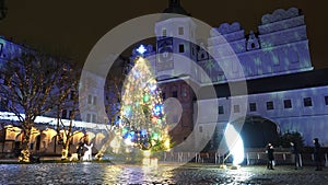 Ducal Castle of Szczecin and christmas tree, illuminated for Christmas and festive season - West Pomerania, Szczecin Poland