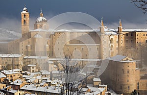 The ducal palace of Urbino under winter storm