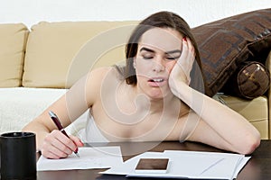 Ducation and business concept, girl with pile of notes indoors