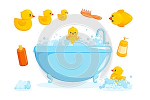 Duck and bath with combs and foam. Bathing set with tub, cosmetics, yellow rubber ducks isolated in white background