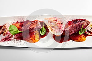 Duck breast with roasted plum dish