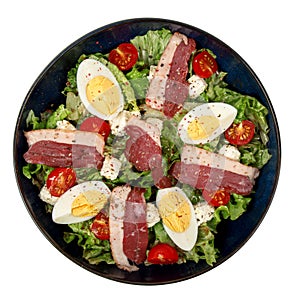 Duck breast salad, egg, cherry tomatoes and lettuce