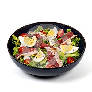 Duck breast salad, egg, cherry tomatoes and lettuce