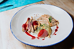 Duck fillet with chocolate sauce, berries and juniper sauce.