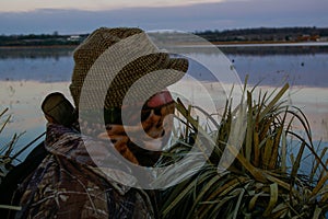 Duck Hunter In Blind Waiting