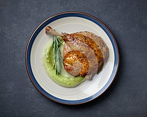 Duck leg confit and broccoli puree