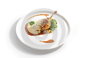 Duck Leg Confit with Pearl Barley on Restaurant Plate Isolated