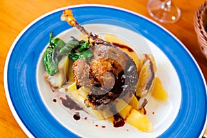 Duck leg confit in port with pear chutney