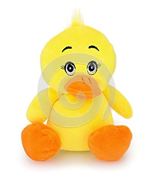 Duck plushie doll isolated on white background with shadow reflection. Duckling plush stuffed puppet on white backdrop.