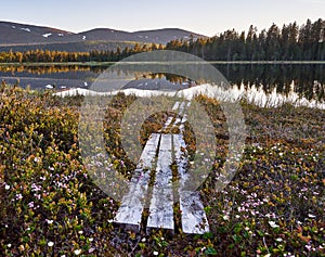 Duckboards leading to the lake in Lapland