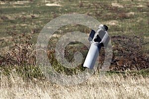 Dud multiple rocket launchers Hurricane sticking in the steppe photo