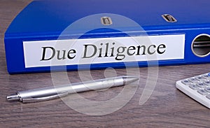 Due Diligence binder in the office