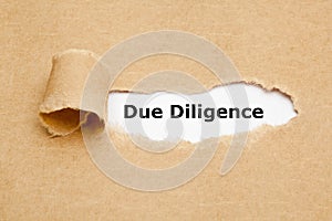Due Diligence Risk Management Ripped Paper Concept