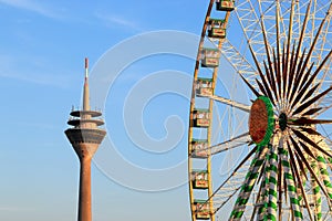 Duesseldorf Rhine carnival, big ferris wheel and Rhine Tower