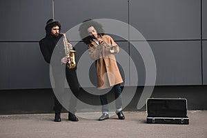 duet of street jazzmen playing trumpet