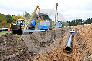 A Dug trench in the ground for the installation and installation of industrial gas and oil pipes.