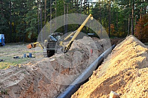 A Dug trench in the ground for the installation and installation of industrial gas and oil pipes.