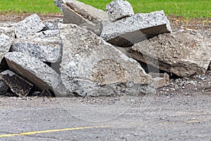 Dug-up Broken Pavement Fragments in a Parking Lot