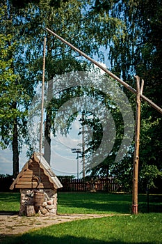 A dug well, large shadoof well sweep in Bareikiskes, Lithuania