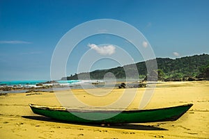 Dugout canoe on beach Almejal at the pacific coast next to El Valle in Choco region of Colombia