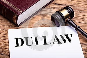 DUI Law With Gavel On Wooden Desk