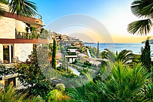 Dukley Gardens - elite real estate along Adriatic sea coast, has modern villas and luxury apartments. Rich resort on sunset, hotel