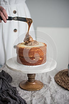 Dulce de Leche Cake being filled