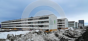 Dull rows of long Inuit living buildings in Arctic capital Nuuk