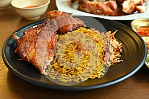 Dum Handi chicken Biryani in plate . Popular Indian food