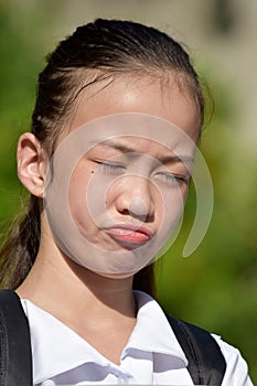 Dumb Young Girl Student With Textbooks