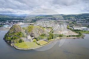 Dumbarton castle building on volcanic rock aerial view from above Scotland