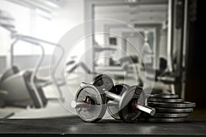 Dumbbell, barbell and workout in the gym. Copy space for text or decoration.