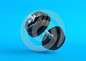 Dumbbell with black plates levitating in air on bright blue background