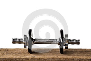 Dumbbell Exercise for good health on wooden table. backdrop for idea concept art work design or add text message