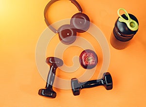 Dumbbell, headphones equipment for workout exercise