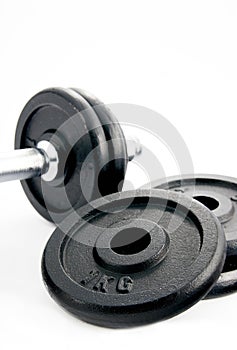 Dumbbell isolated on white background.