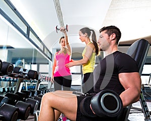 Dumbbell man at gym workout fitness weightlifting
