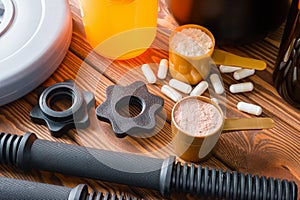 Dumbbell with plastic stamp, and sports nutrition shaker