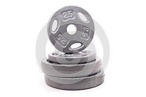 Dumbbell Weights Stacked on White