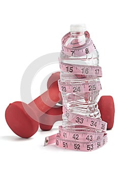 Dumbbell weights with tape measure and water bottle